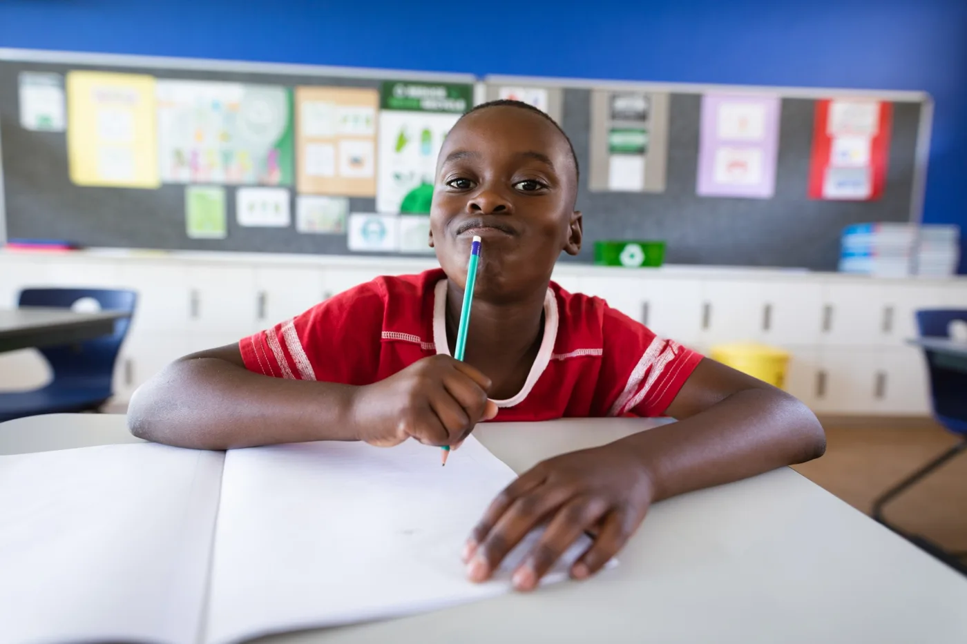 Pupil at his desk